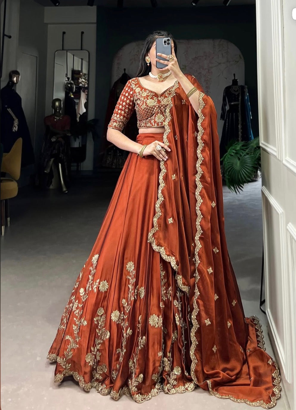 Rust glowing in gold Chaniya Choli