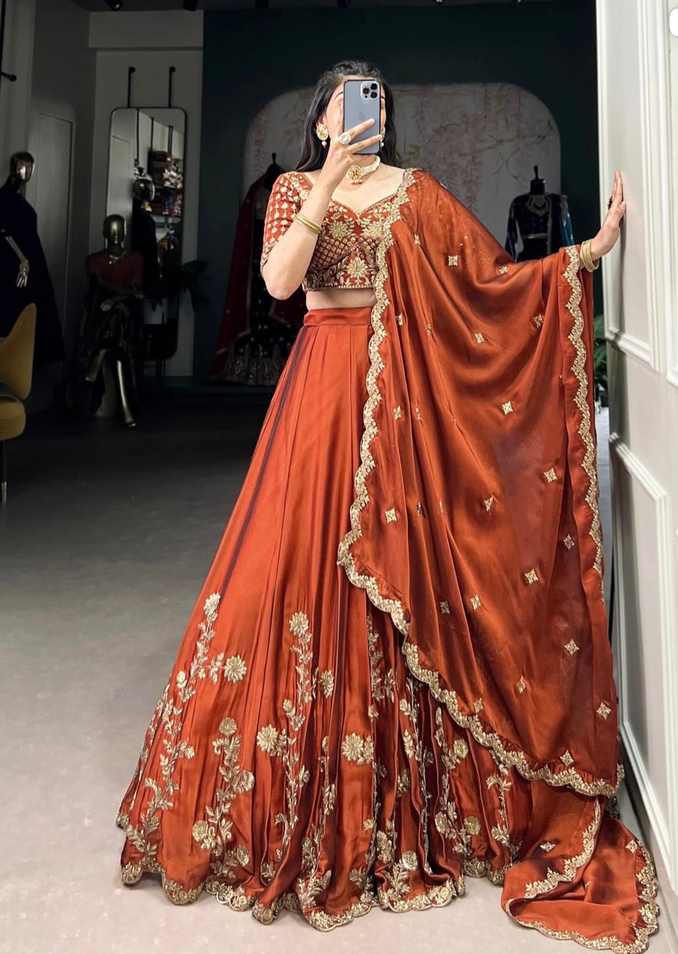 Rust glowing in gold Chaniya Choli