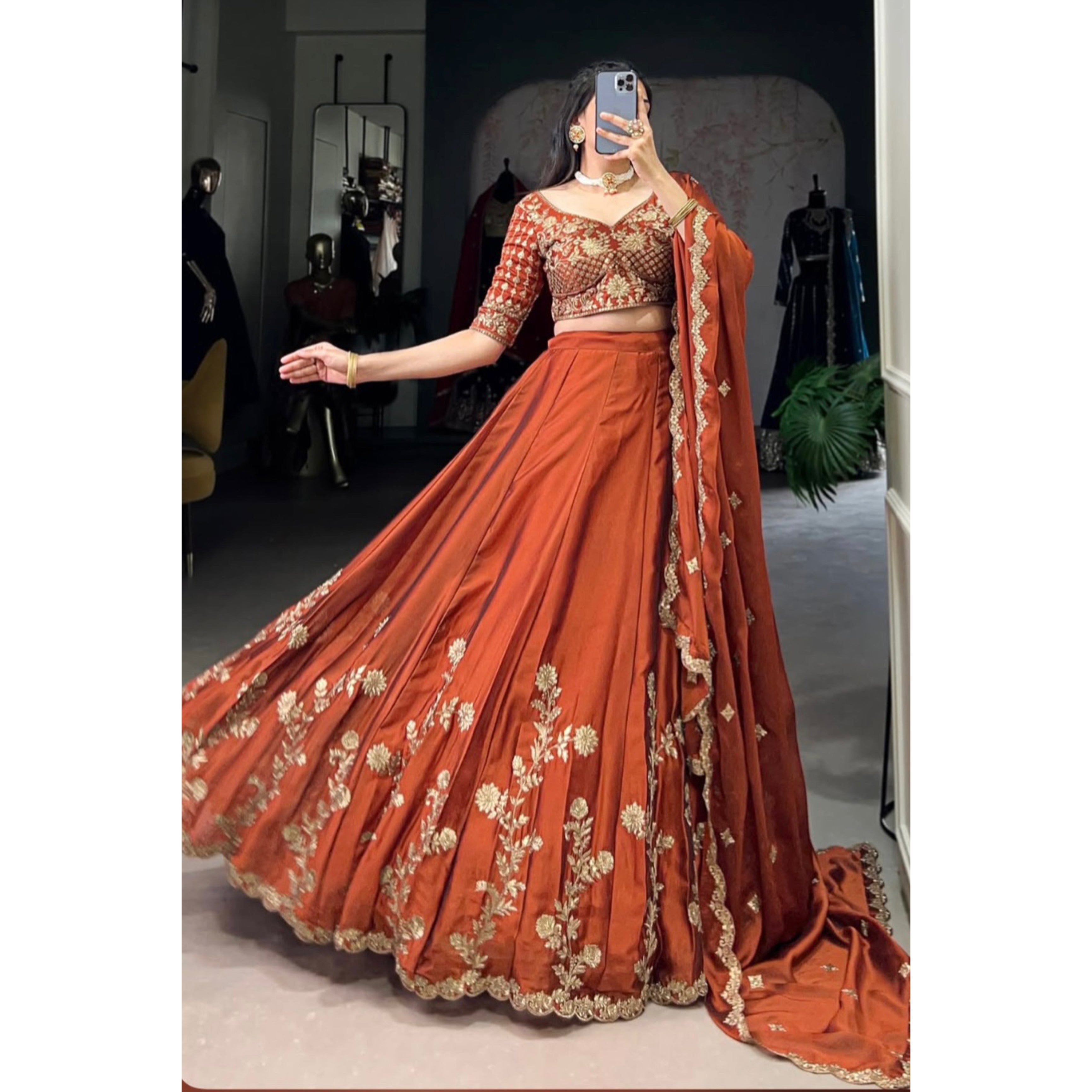 Rust glowing in gold Chaniya Choli