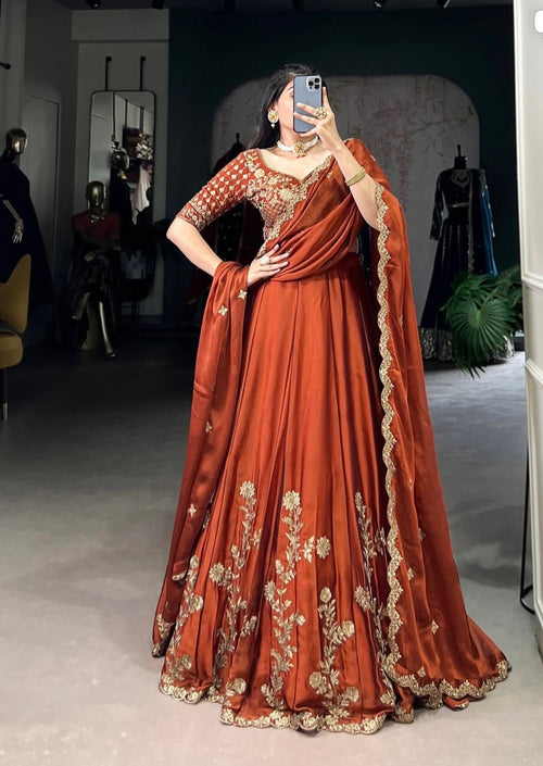 Rust glowing in gold Chaniya Choli