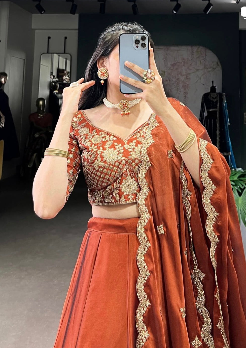 Rust glowing in gold Chaniya Choli