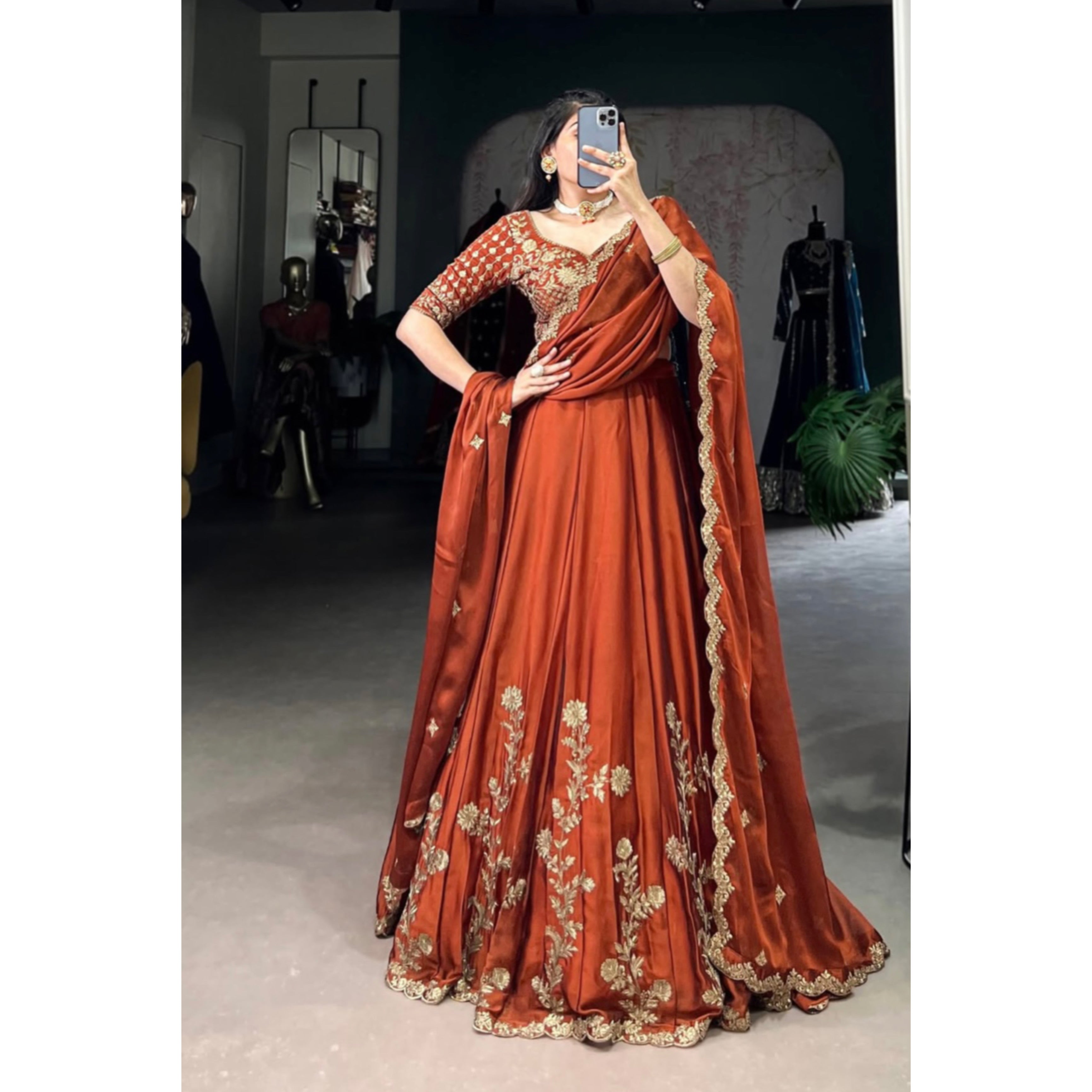 Rust glowing in gold Chaniya Choli